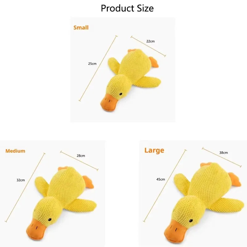 Dog sleeping with a dog hug duck toys to relieve boredom of little yellow duck pet